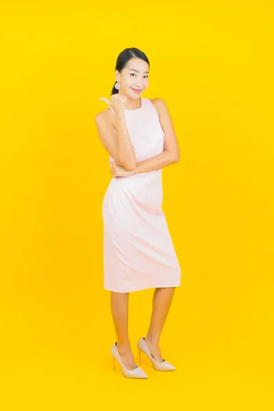 Portrait Beautiful Young Asian Woman Smile Action Yellow Color Background — Stock Photo, Image