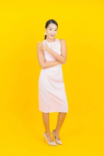 Portrait Beautiful Young Asian Woman Smile Action Yellow Color Background — Stock Photo, Image