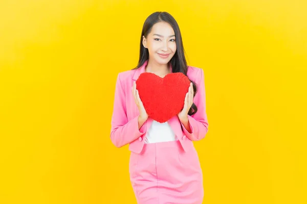 Portrait Beautiful Young Asian Woman Smile Heart Pillow Shape Yellow — Stock Photo, Image