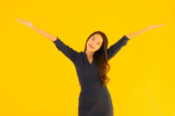 Portrait Beautiful Young Asian Woman Action Isolated Yellow Background — Stock Photo, Image