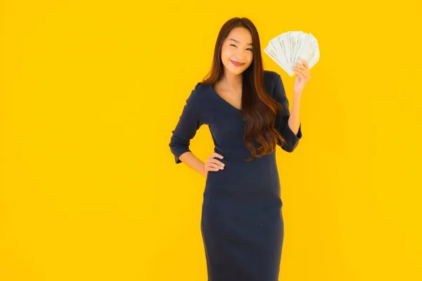 Portrait Beautiful Young Asian Woman Money Cash Yellow Isolated Background — Stock Photo, Image