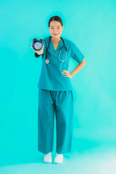 Portriat Beautiful Young Asian Doctor Woman Show Clock Alarm Blue — Stock Photo, Image