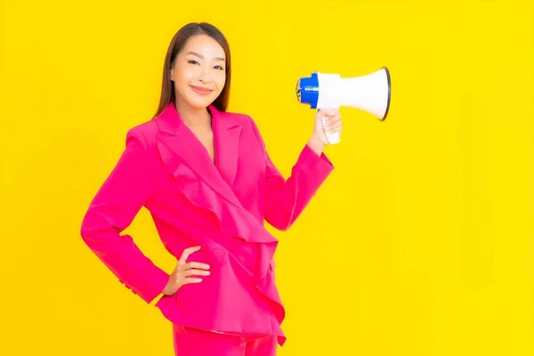 Portrait Beautiful Young Asian Woman Megaphone Communication Yellow Isolated Background — Stock Photo, Image