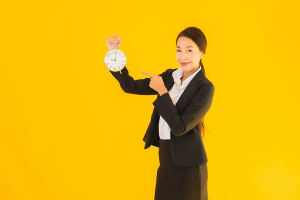 Portrait Beautiful Young Asian Woman Show Time Clock Alarm Yellow — Stock Photo, Image