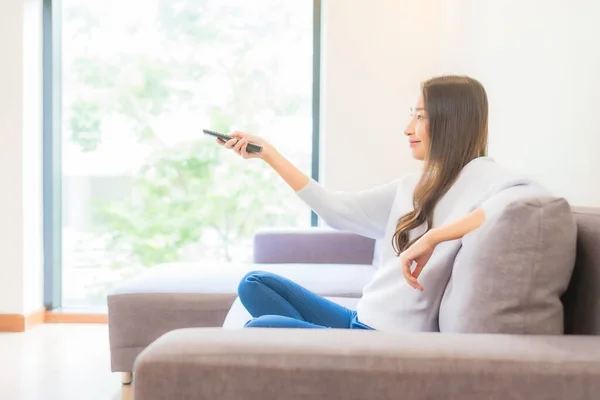 Portrait Beautiful Young Asian Woman Use Remote Change Channel Television — Stock Photo, Image