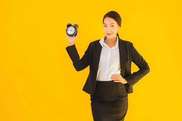 Portrait Beautiful Young Asian Woman Show Time Clock Alarm Yellow — Stock Photo, Image