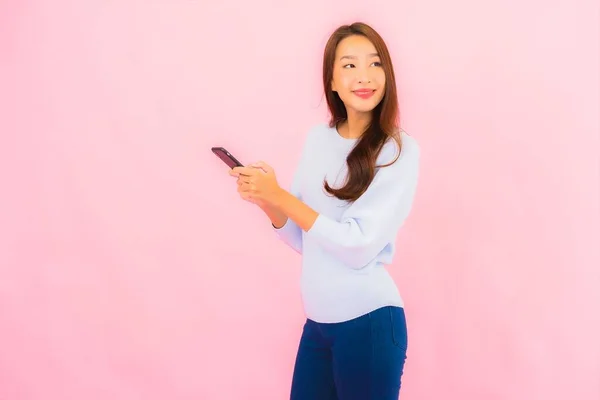 Portrait Beautiful Young Asian Woman Use Smart Mobile Phone Pink — Stok fotoğraf