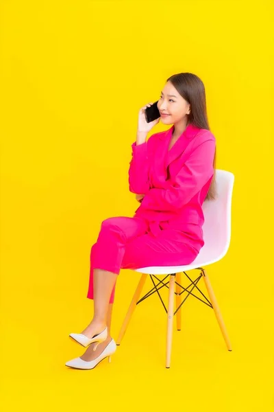 Portrait Beautiful Young Asian Woman Use Smart Mobile Phone Yellow — Stock Photo, Image