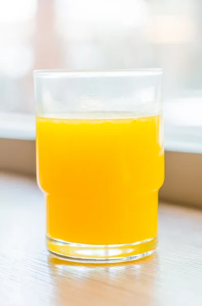 Appelsinjuice glas - Stock-foto