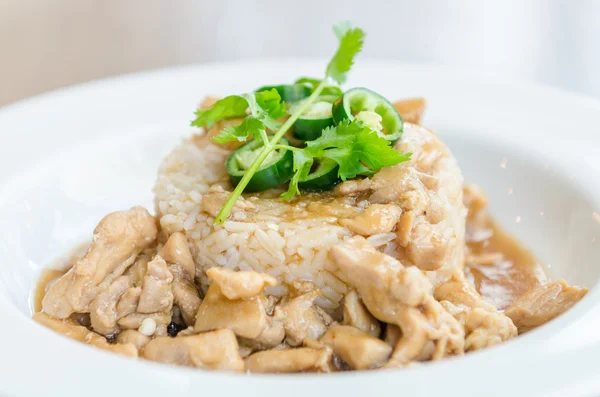 Chicken with brown sauce on rice — Stock Photo, Image