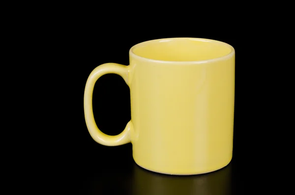 Taza sobre un fondo negro — Foto de Stock