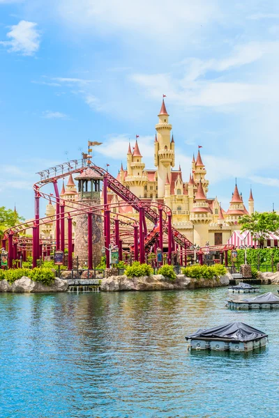 Beautiful castle and roller coaster — Stock Photo, Image