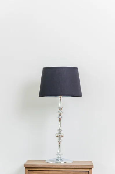 Lamp on bedside table — Stock Photo, Image