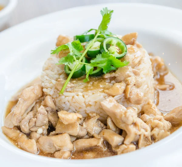 Chicken with sauce on rice — Stock Photo, Image