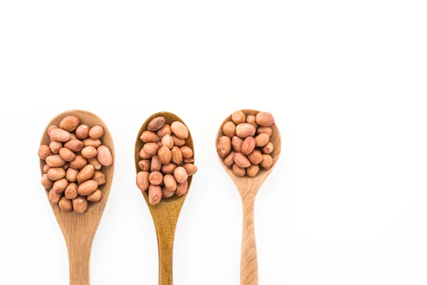 Peanuts in spoon — Stock Photo, Image