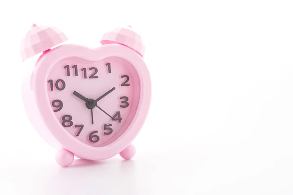 Pink alarm clock isolated on white background Stock Image