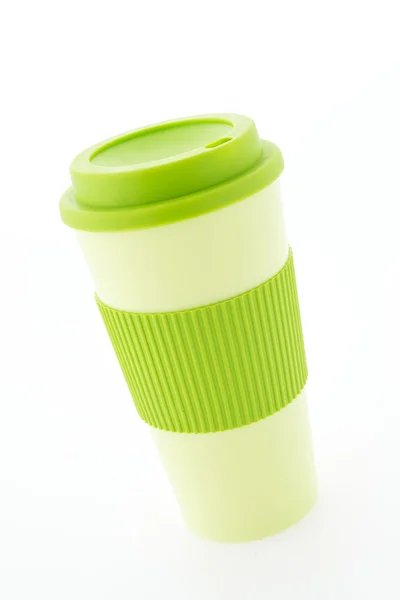 Green plastic coffee mug isolated on white background — Stock Photo, Image