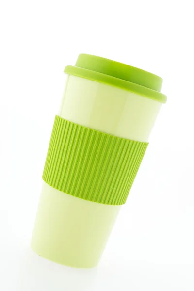 Green plastic coffee mug isolated on white background — Stock Photo, Image