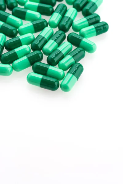 Pilulky tabulky izolovaných na bílém pozadí — Stock fotografie
