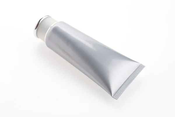 Botella de crema cosmética aislada sobre fondo blanco — Foto de Stock
