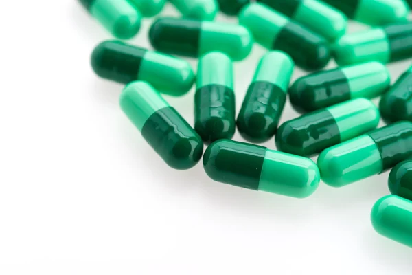 Tavole di pillole isolate su sfondo bianco — Foto Stock