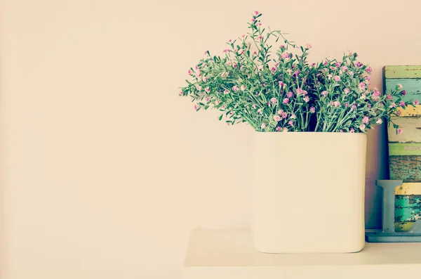 Interior plastic flower in vase — Stock Photo, Image