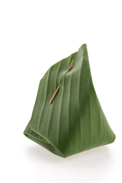 Embalaje de hojas de plátano arroz pegajoso — Foto de Stock