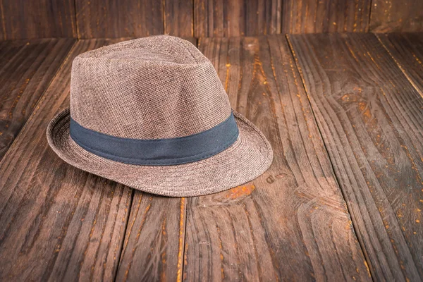 Beach hat on wooden background — Stock Photo, Image