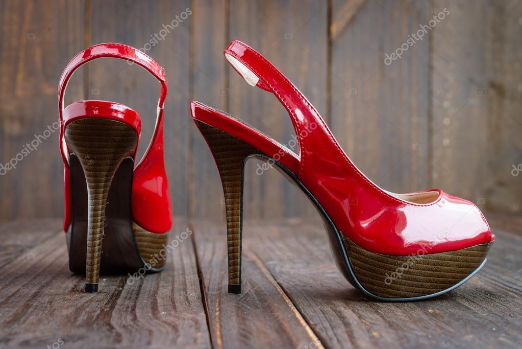 red wooden heels