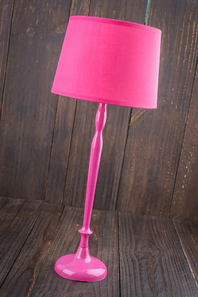 Lámpara sobre fondo de madera — Foto de Stock