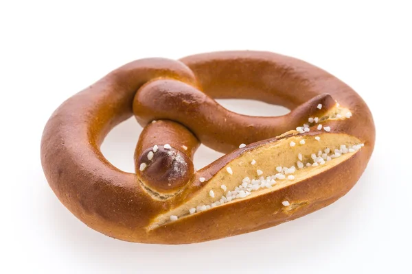 Delicious pretzel on white — Stock Photo, Image