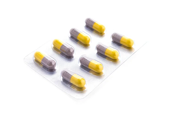 Pillola capsula isolata su sfondo bianco — Foto Stock