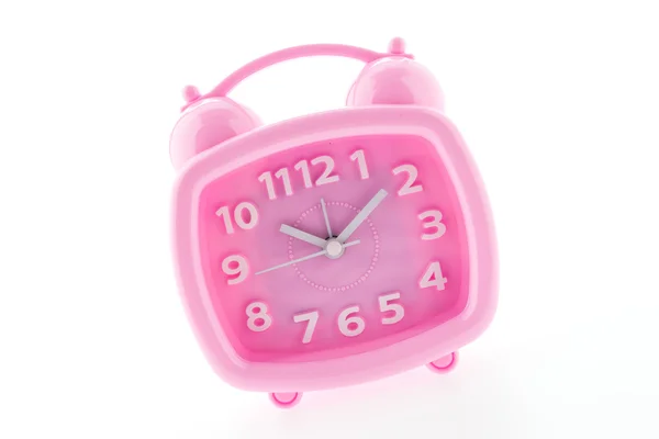 Reloj rosa aislado sobre fondo blanco — Foto de Stock