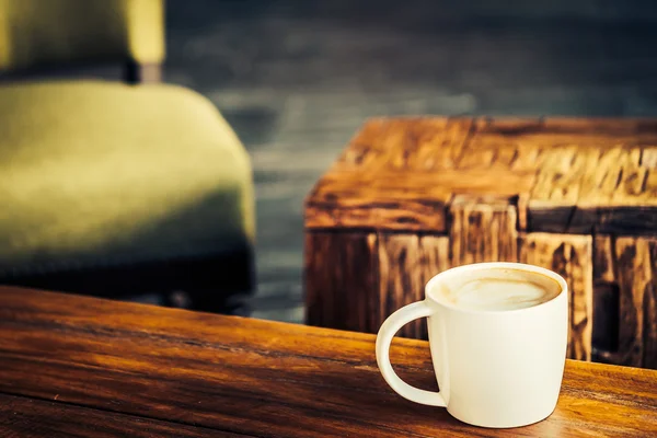 Cup of hot coffee on an old wooden table. Stock Photo by ©Valentyn_Volkov  54495007