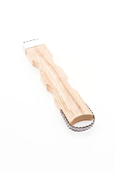 Wooden coconut grater — Stock Photo, Image
