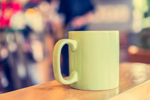 Xícara de café no café — Fotografia de Stock