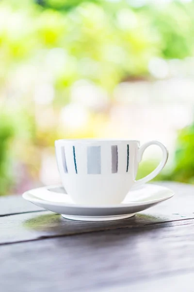 Coffee cup on wooden table — Stock Photo, Image