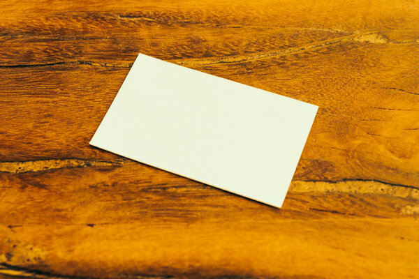 White card on wood