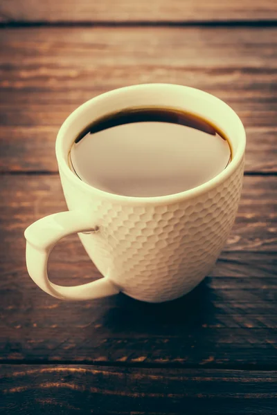 Coffee cup in coffee shop — Stock Photo, Image