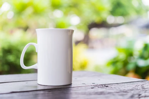 Coffee cup on wood — Stock Photo, Image