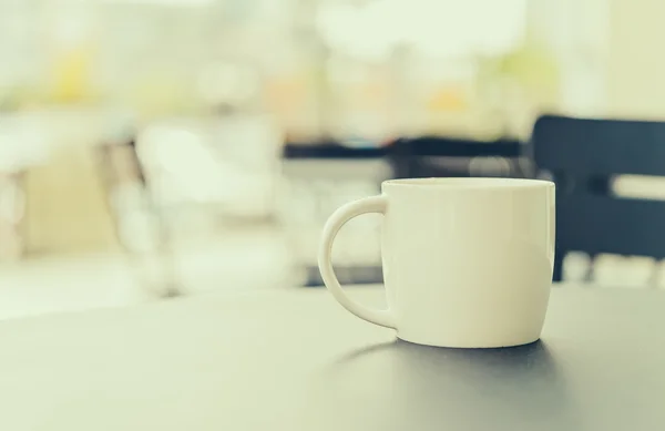 Coffee cup on wood — Stock Photo, Image