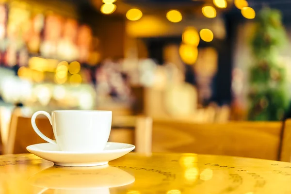 Coffee cup on wooden table — Stock Photo, Image