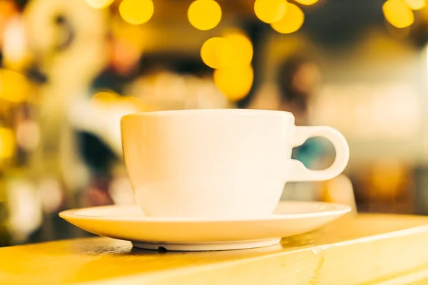 Xícara de café na mesa de madeira — Fotografia de Stock