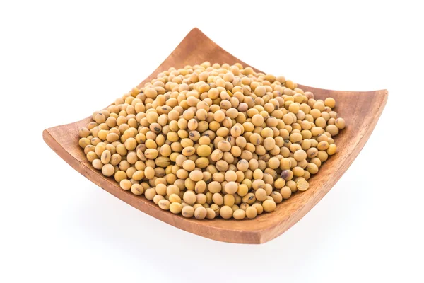 Soybeans in a wooden bowl — Stock Photo, Image
