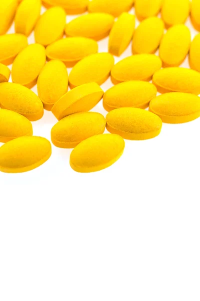 Yellow pill tables — Stock Photo, Image