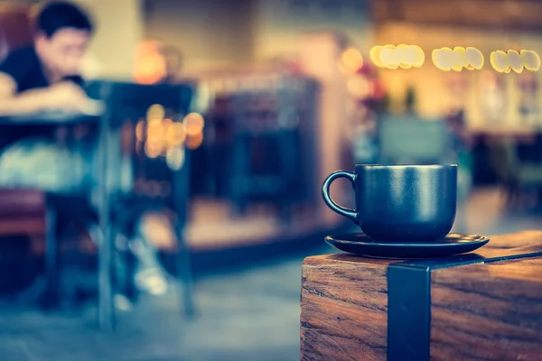 Кофейная кружка в кафе Стоковое Изображение