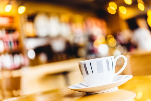 Xícara de café na mesa de madeira — Fotografia de Stock