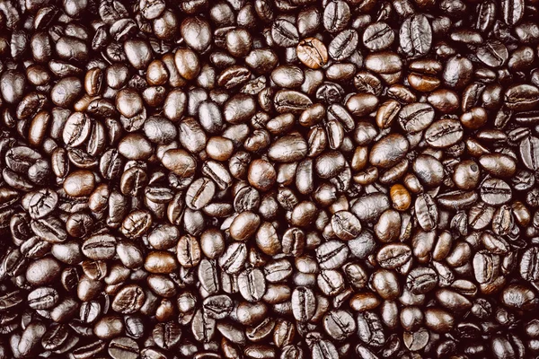 Coffee beans on wooden background — Stock Photo, Image