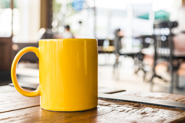 Coffee cup on wooden table