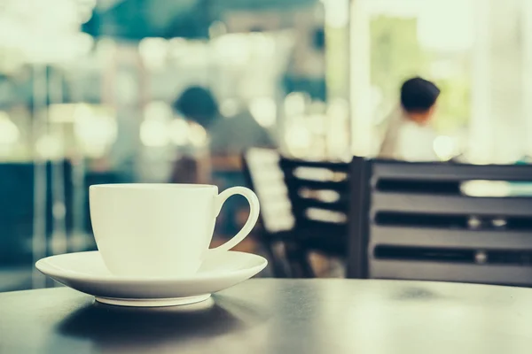 Šálek kávy v kavárně — Stock fotografie